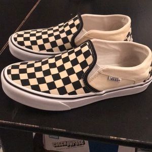 Vans checkered classic slip on
